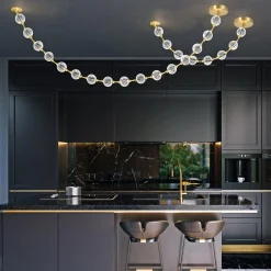 Efektowna lampa wisząca LED Marni długa - Naturalny mosiądz (QN-MARNI-16P-292-NBR) - Quintiesse